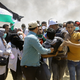 Palestinian protesters evacuate a wounded youth near the Israeli border fence, east of Khan Younis, in the Gaza Strip, Monday, May 14, 2018. Thousands of Palestinians are protesting near Gaza’s border with Israel, as Israel prepared for the festive inauguration of a new U.S. Embassy in contested Jerusalem.